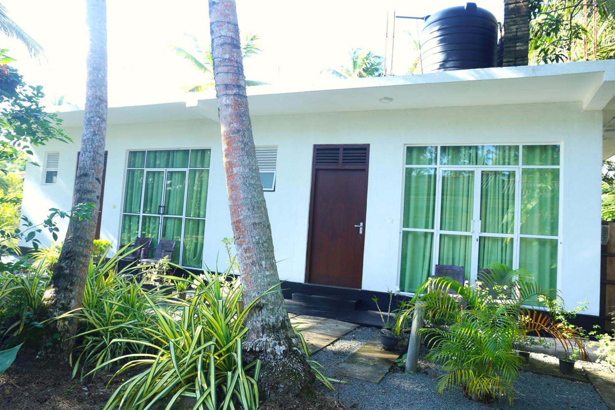 היקדואה Sandy Palms Guesthouse מראה חיצוני תמונה
