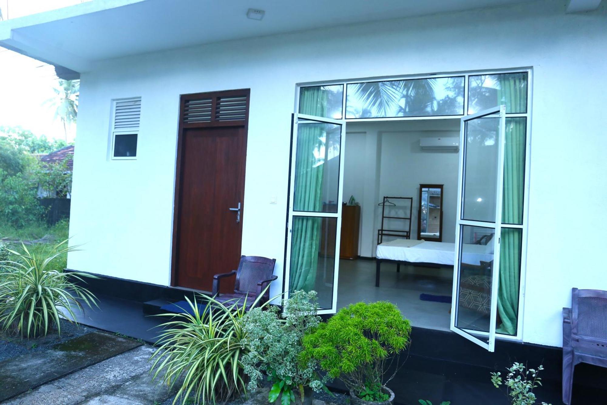 היקדואה Sandy Palms Guesthouse מראה חיצוני תמונה